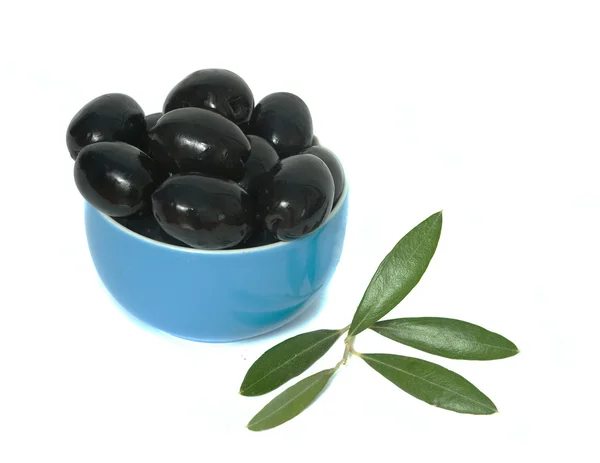 Blue cup full of black olives — Stock Photo, Image