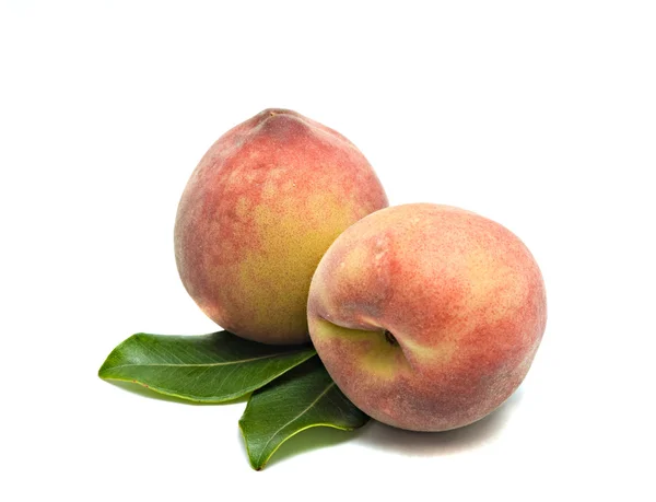 Два персика — стоковое фото