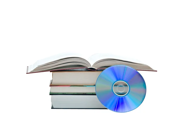 Pile of books, open book, and DVD — Stock Photo, Image