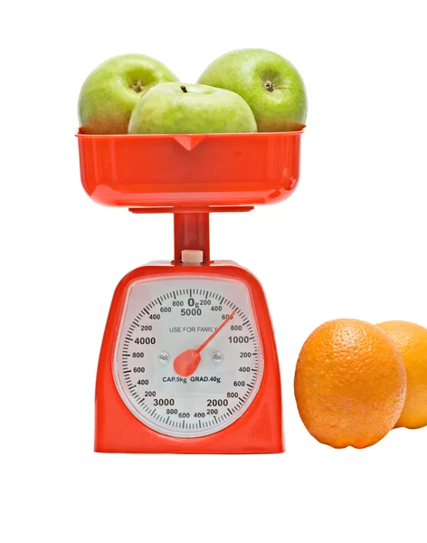 Cozinha balança de peso maçãs — Fotografia de Stock