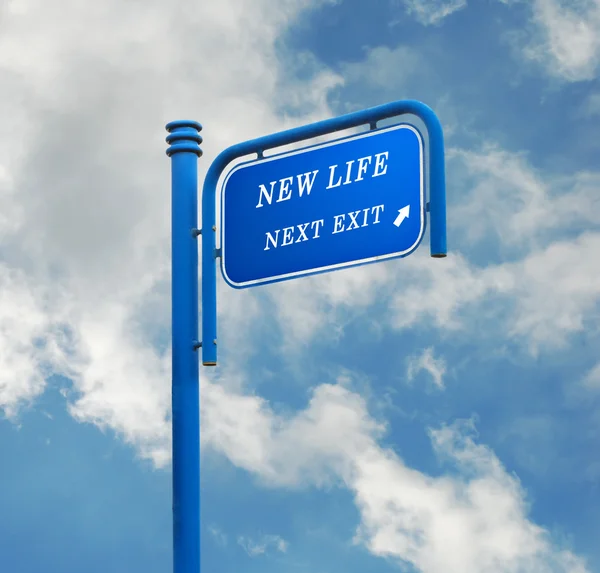 Road sign to new life — Stock Photo, Image