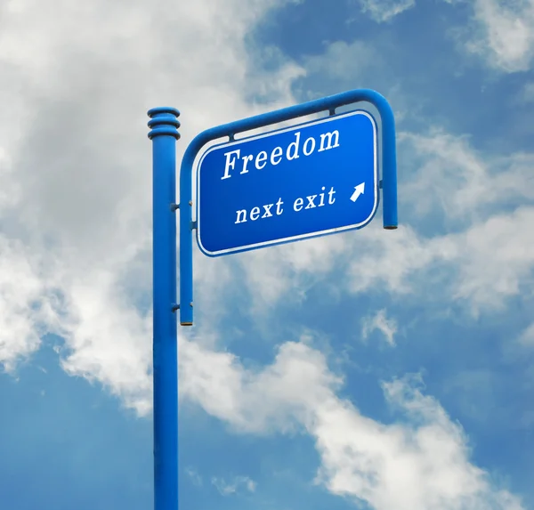 Road sign to freedom — Stock Photo, Image