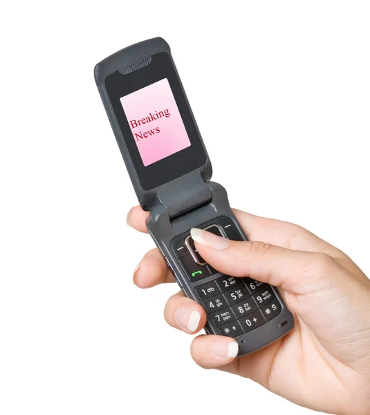 Teléfono móvil con la etiqueta "Noticias de última hora" en su pantalla — Foto de Stock
