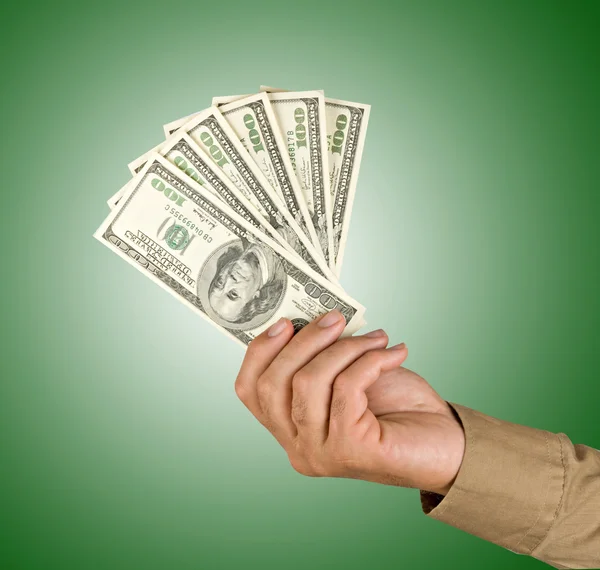 Hand with dollar bills — Stock Photo, Image