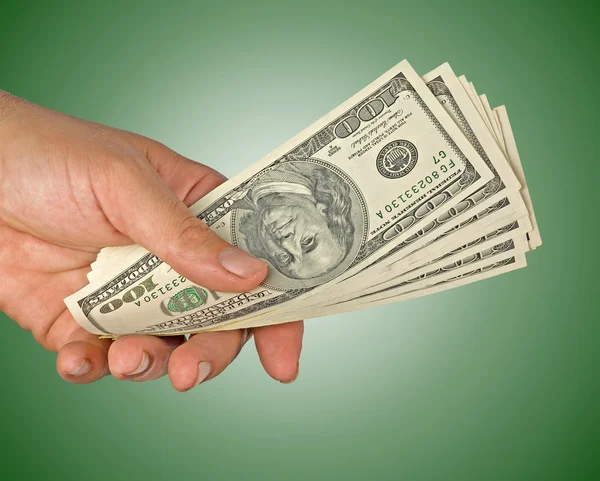 Mão com dólares — Fotografia de Stock