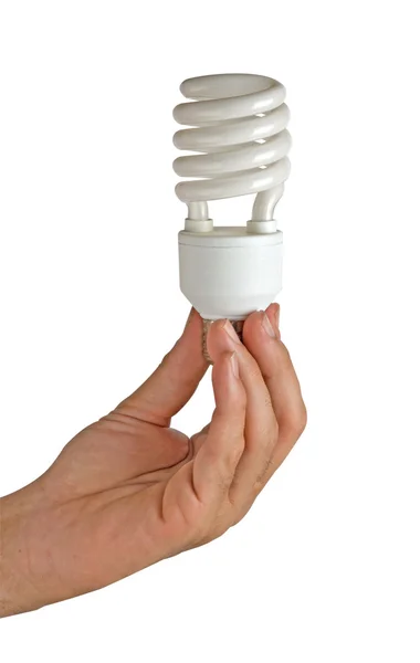 Mão segurando uma lâmpada economizadora de energia — Fotografia de Stock