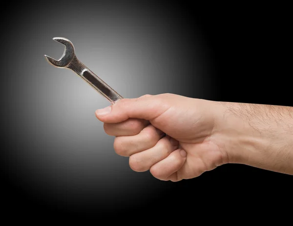 Offener Schraubenschlüssel in der Hand — Stockfoto