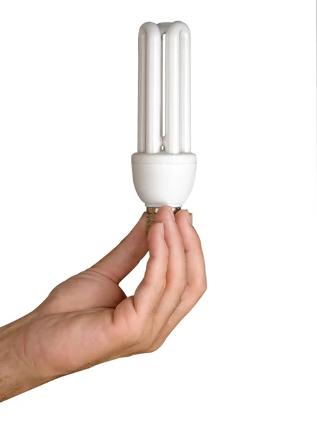Hand holding an energy-saving lamp — Stock Photo, Image