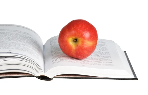 Mela rossa su libro aperto — Foto Stock