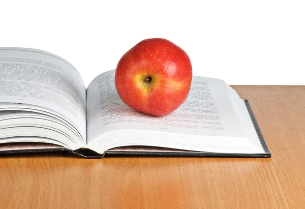 Manzana roja en libro abierto — Foto de Stock