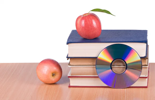 Μήλα, dvd και βιβλία ως σύμβολα της μετάβασης από παλιά να ΝΕ — Φωτογραφία Αρχείου