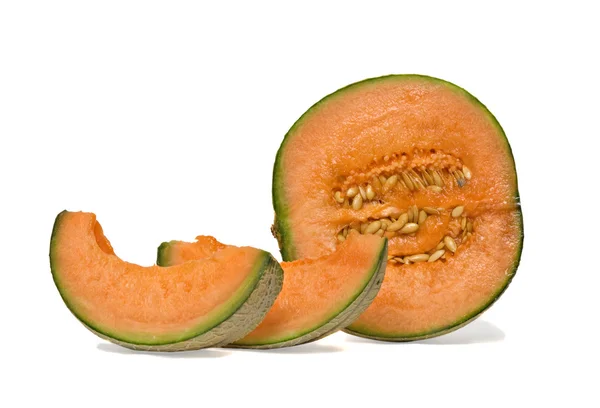 Sección y segmentos de melón — Foto de Stock