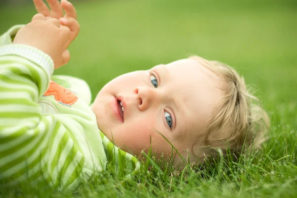 Funny boy on the grass — Stock Photo, Image