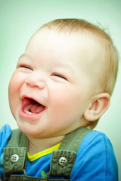 Little boy laughs
