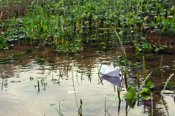 stock image Paper boat in puddle