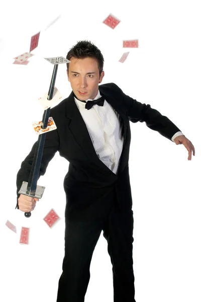 Magician with sword and cards — Stock Photo, Image