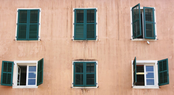 Windows on old building in Kerkyra (Corfu town) on Corfu island, Greece