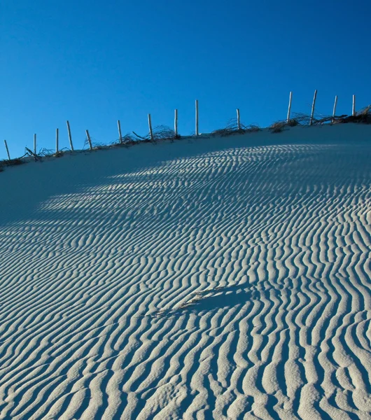 Větrné vzory na písečné duny — Stock fotografie