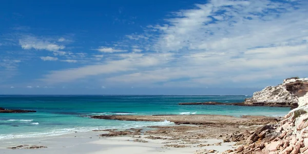 stock image Panoramic of beach on a rocky coast