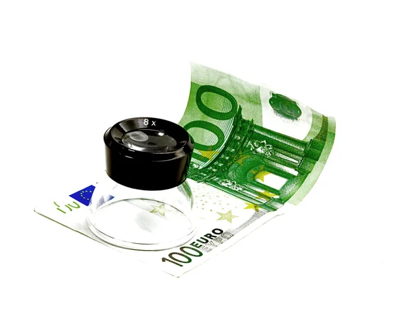 One undred euro bill and a lupe — Stock Photo, Image