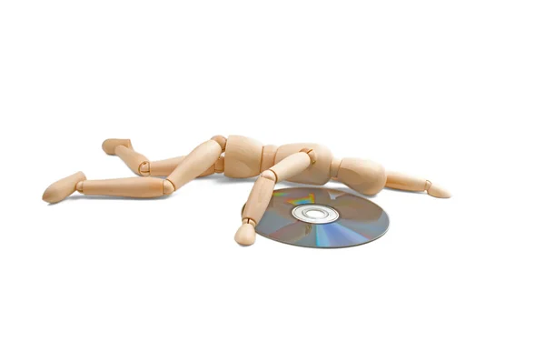Wood mannequin with CD-rom — Stock Photo, Image