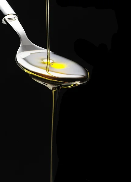 stock image Olive oil on a spoon