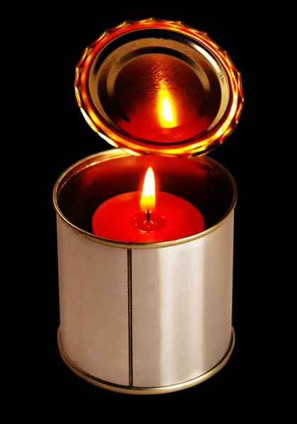 Candle on a tin can — Stock Photo, Image