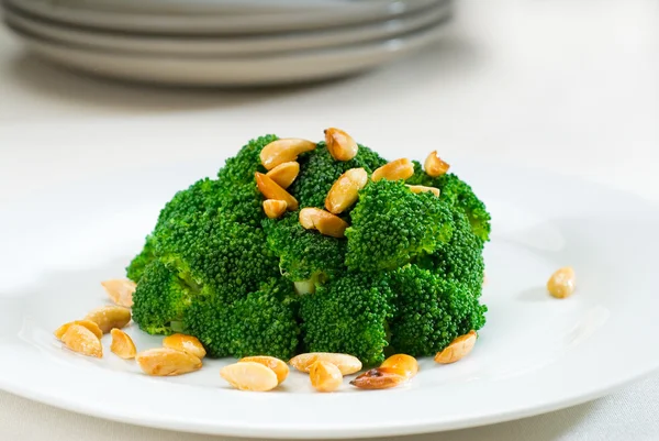 Fresh sauteed broccoli and almonds — Stock Photo, Image