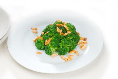 Fresh sauteed broccoli and almonds clipart