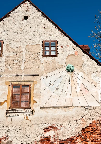 Sundial clock on old house wall. — Stock Photo, Image