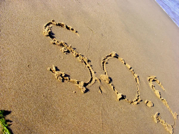 S.O.S. на песке — стоковое фото