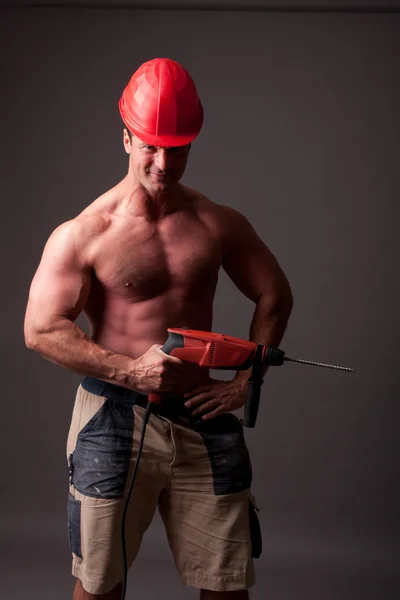 Muskulös byggnadsarbetare — Stockfoto