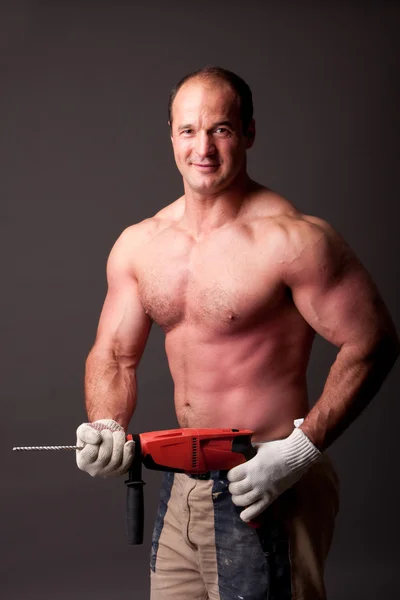 Muscular construction worker — Stock Photo, Image