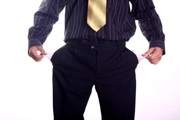 Man Pulling out Empty Pockets — Stock Photo, Image
