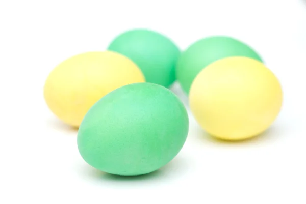 Five yellow and green Easter eggs isolat Stock Photo