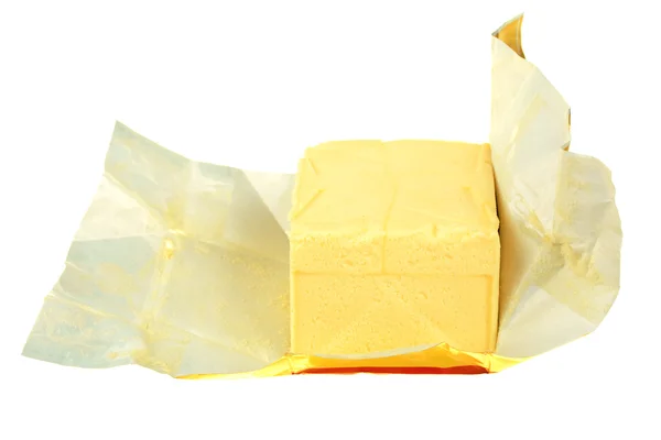 Butter in paper — Stock Photo, Image