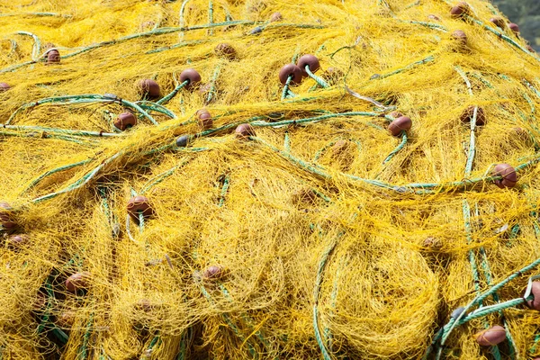 Yellow fishing net Stock Image