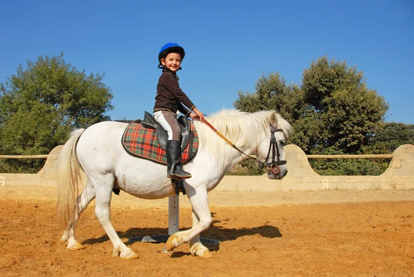 Kind en pony — Stockfoto