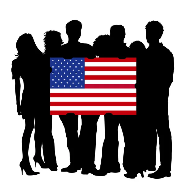 Молодые с флагами США — стоковое фото