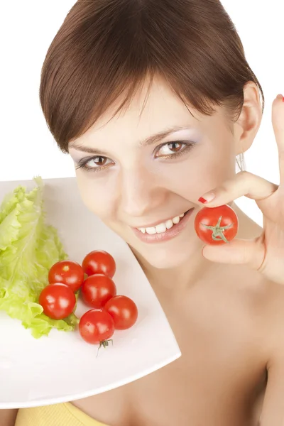 Girl with red tomatoes — Stock Photo, Image