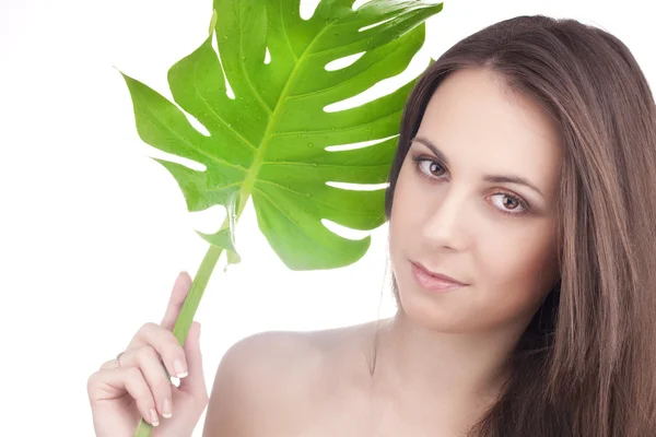 Girl with green leafs — Stock Photo, Image