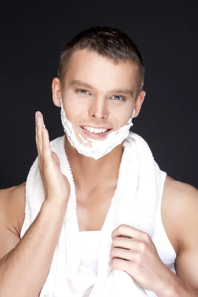 stock image Handsome man shaves