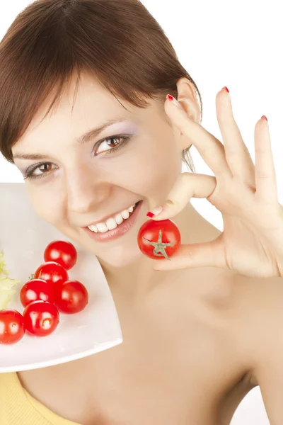 Mädchen mit roten Tomaten — Stockfoto