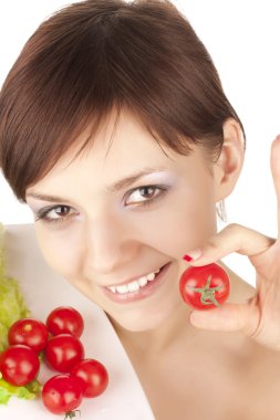 kırmızı domates ile kız