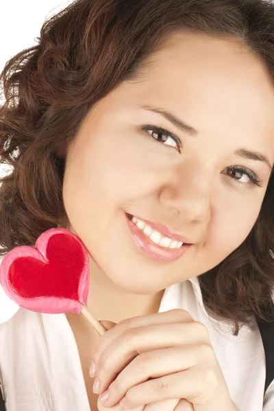 Beautiful girl holding red heart — Stock Photo, Image