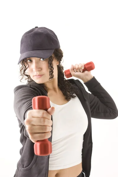 Woman with red dumbbells in hands — Stock Photo, Image