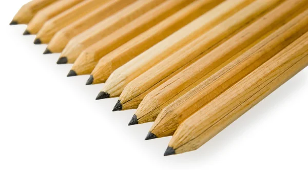 Lápis amarelos forrados obliquamente — Fotografia de Stock