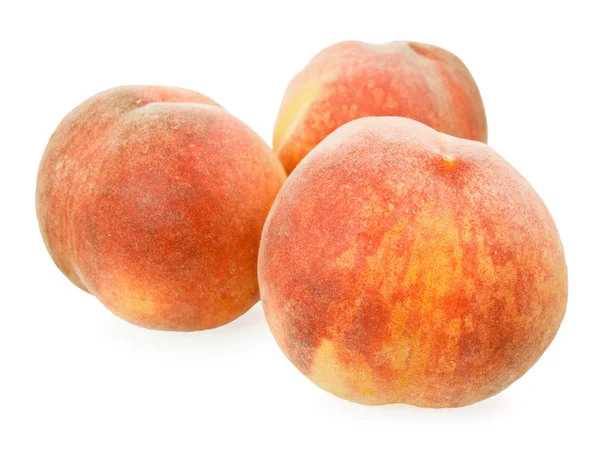 Три персика — стоковое фото