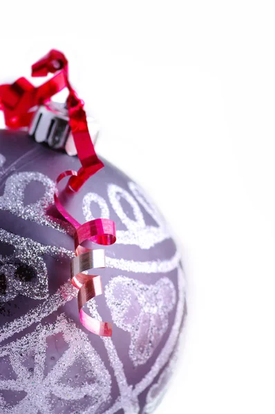 Christmas ball with red ribbon — Stock Photo, Image