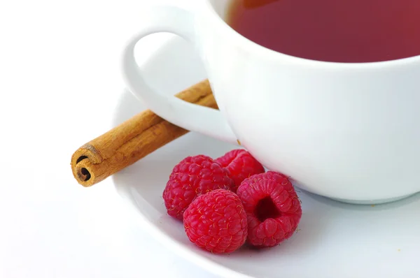 Raspberry tea and cinnamon — Stock Photo, Image